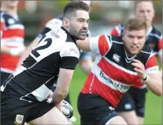  ??  ?? Jonathan Williams makes a break for Dundalk.