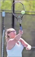  ?? Jeremy Stewart / RN-T ?? Rockmart’s Alexis Clanton goes up for a shot at the net during her No. 1 doubles match Tuesday.