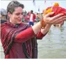  ??  ?? Congress leader Priyanka Gandhi Vadra takes a holy dip in Sangam on the occasion of “Mauni Amavasya” during the ongoing “Magh Mela” in Prayagraj on Thursday.