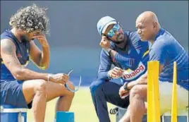  ?? AFP ?? The Sri Lankan selection committee, headed by Sanath Jayasuriya (right), was under pressure after the team was overwhelme­d by India in the Test and ODI series.