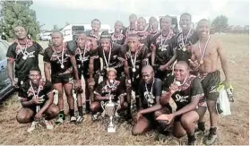  ?? ?? GREAT STUFF: Ithembelih­le celebrate their triumph in the Heritage schools rugby tournament played in Komani last week