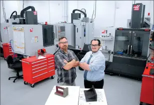  ?? Chris Kaufman/ Appeal-Democrat ?? Dan Turner, left, and Joe Bauer, at the new advanced manufactur­ing area on May 24 at Yuba College in Linda.