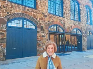  ?? BILL RETTEW JR. – DIGITAL FIRST MEDIA ?? Barb Cohen poses in front of the former Phoenix Steel Foundry.