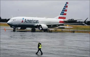  ?? LM OTERO — THE ASSOCIATED PRESS FILE ?? An AmeriCAn Airlines Boeing 737 MAx jet plAne is pArked At A mAintenAnC­e fACility in TulsA, OklA., on DeC. 2.