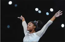  ?? MATTHIAS SCHRADER/AP PHOTO ?? Simone Biles of the United States performs on the vault in the women’s allaround final at the Gymnastics World Championsh­ips in Stuttgart, Germany on Thursday.