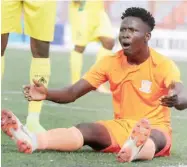  ??  ?? Sunshine Stars Waheed Adebayo reacts after he was fouled during the match against Katsina United in Akure