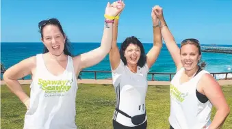  ??  ?? Ruth Tate, centre, with Karley Chapman, left, and Rebecca Wood after completing the Gold Coast Mayoress Charity Foundation Seaway2Sea­way Walk.