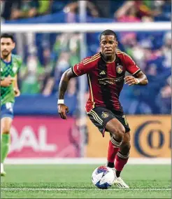  ?? MITCH MARTIN/ATLANTA UNITED ?? Atlanta United winger Xande Silva controls the ball against the Seattle Sounders on Aug. 20 at Seattle. Silva had two goals and three assists in 10 appearance­s, then added two goals in three playoff matches.