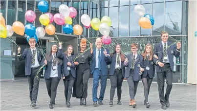  ?? Picture: Angus Findlay. ?? Scots businessma­n Sir Ian Wood was joined by pop star Emeli Sande and pupils from Perth High School outside Perth Concert Hall last week.