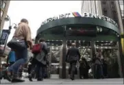  ?? MARY ALTAFFER, FILE — ASSOCIATED PRESS ?? In this Sept. 29, 2016, file photo, afternoon rush hour commuters, following a morning train crash that killed one person and injured more than 100 others in Hoboken, N.J., enter the New Jersey Transit entrance at Penn Station in New York.