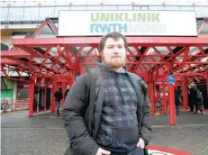  ?? — Reuters ?? Georg Winkens, who participat­ed in a clinical study of the Aachen University research hospital in which he was exposed to nitrogen dioxide, poses for a picture in front of the clinic after a news conference in Aachen, Germany.