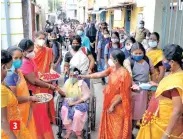  ??  ?? (3) A diff-abled student offered sweets at Thottapala­yam Girls HS in Vellore;