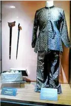  ??  ?? a pair of shirt and trousers that was once worn by Sultan Sir abdul Samad (fourth Sultan of Selangor, circa 1859). — rOuWen LIn/the Star