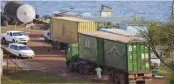  ??  ?? Trucks containing bags of sugar belonging to Kakira Sugar Ltd being transporte­d back to Kakira after Tanzania Revenue Authority rejected its entry over non-payment of taxes in August 2018. Tanzania has banned sugar importatio­n again