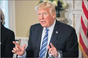  ?? AP PHOTO ?? U.S. President Donald Trump gestures as he answers a question regarding the ongoing situation in North Korea, Friday at Trump National Golf Club in Bedminster, N.J.