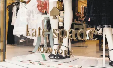  ?? Vincent Tullo / New York Times ?? The flagship Kate Spade store, on Madison Avenue in Manhattan, the day after she was found dead.