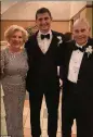  ?? FACEBOOK ?? Jake Samuelson (center) of Atlanta with his grandparen­ts, Myriam and Arnie Notkin, who are among the missing after their condominiu­m in Florida collapsed.