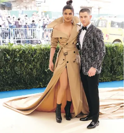  ?? THE ASSOCIATED PRESS ?? Quantico actress Priyanka Chopra, 35, left, and pop singer Nick Jonas, 25, made their first public appearance together at the Metropolit­an Museum of Art’s Costume Institute benefit in 2017 in New York City.