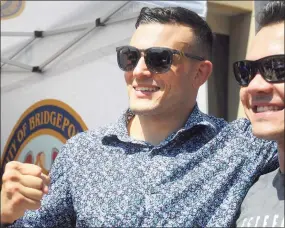  ?? Ned Gerard / Hearst Connecticu­t Media ?? Nick Newell, a mixed martial arts fighter from Milford, poses with a fan during a press event at the Morton Government Center in Bridgeport in 2019.