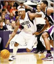  ??  ?? Dallas Mavericks’ Jason Terry attacks Sacramento Kings’ Tyreke Evans at the American Airlines Centre on Saturday.