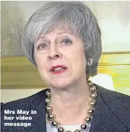  ??  ?? Mrs May in her video message