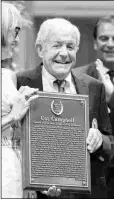  ?? BARBARA D. LIVINGSTON ?? Hall of Fame inductee Cothran “Cot” Campbell poses with his plaque.