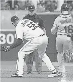  ?? KIRTHMON F. DOZIER/ DETROIT FREE PRESS ?? Armando Galarraga lost his perfect game on June 2, 2010, when umpire Jim Joyce ruled Jason Donald was safe.