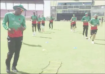  ??  ?? St. Kitts and Nevis Patriots’ Sheldon Cottrell leads the training exercise