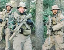  ?? UNIVERSAL PICTURES ?? Lone Survivor, now on Netflix, honours the Navy SEALS in a powerful depiction of war.