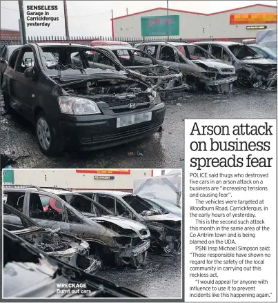  ??  ?? SENSELESS Garage in Carrickfer­gus yesterday WRECKAGE Burnt out cars