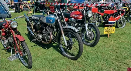  ??  ?? 1: Tele forked Model X Matchless nested between two very different Moto Guzzis.