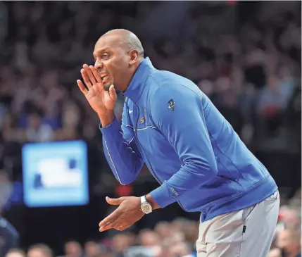  ?? ABBIE PARR/GETTY IMAGES ?? Memphis head coach Penny Hardaway calls a play during the first half against Gonzaga in the second round of the 2022 NCAA Tournament on March 19 at Moda Center in Portland, Ore.