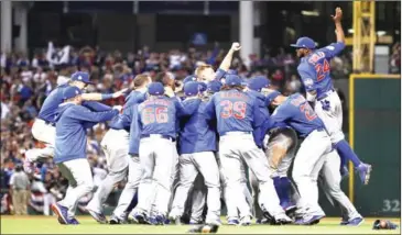  ??  ?? The Chicago Cubs celebrate beating the Cleveland Indians 8-7 in Game 7 of the 2016 World Series in Ohio on November 2 to win their first World Series in 108 years.