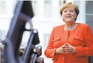  ?? Michael Sohn / Associated Press ?? Polls show that German Chancellor Angela Merkel has a double-digit lead over her main challenger.