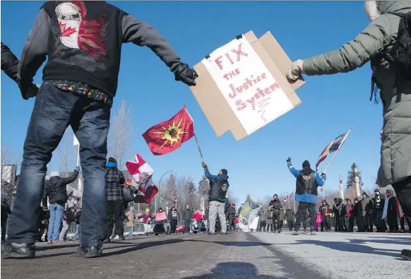  ?? TROY FLEECE ?? Boushie family supporters walk to the Legislativ­e Building in Regina on Monday to protest what they say is injustice that helped lead to last week’s verdict in the Stanley trial.