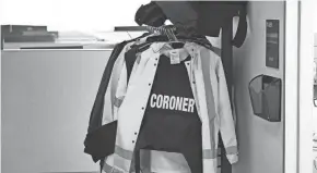  ?? BROOKE LAVALLEY/COLUMBUS DISPATCH ?? Uniforms worn by Franklin County Coroner’s Office staff is shown. When someone dies under circumstan­ces considered suspicious, an autopsy is conducted to learn more.