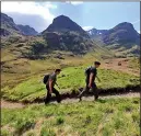  ??  ?? BREATHTAKI­NG: Hikers enjoy the scenery around Glencoe village