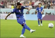  ?? ANDRE PENNER — THE ASSOCIATED PRESS ?? Weston McKennie of the United States kicks the ball during the World Cup group B soccer match between England and The United States, at the Al Bayt Stadium in Al Khor, Qatar on Friday.