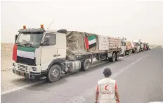  ?? Wam ?? Emirates Red Crescent convoy carrying humanitari­an aid to the liberated areas of Hodeidah, ready to leave from Aden