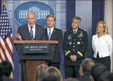  ?? Evan Vucci/Associated Press ?? Director of National Intelligen­ce Dan Coats speaks during a press briefing at the White House on Thursday in Washington, as, from left, FBI Director Christophe­r Wray, National Security Agency Director Gen. Paul Nakasone and Secretary of Homeland Security Kirstjen Nielsen listen.