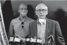  ??  ?? Wisconsin Governor Tony Evers speaks during a news conference Thursday in Kenosha, Wis. [MORRY GASH/ THE ASSOCIATED PRESS]