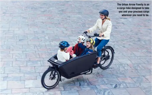  ?? ?? The Urban Arrow Family is an e-cargo bike designed to take you and your precious cargo
wherever you need to be.