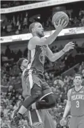  ??  ?? Warriors guard Stephen Curry drives to the basket against the Pelicans on May 6.