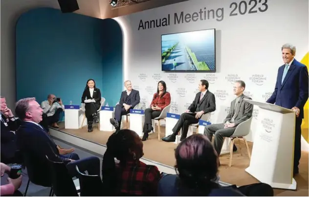  ?? ?? ↑
A panel discussion is in progress at the event in Davos.