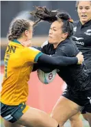 ?? Photo / Getty Images ?? Black Ferns Portia Woodman scored her 200th try.