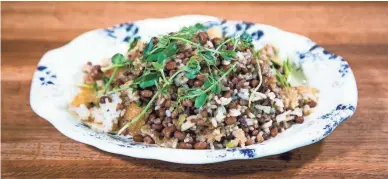  ??  ?? This is the finished Hoppin’ John dish from The Larder + The Delta restaurant in Phoenix.