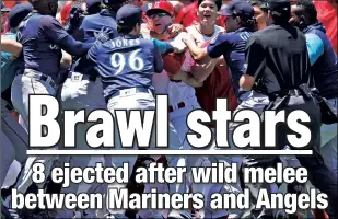  ?? ?? FIGHT CLUBS: The Mariners and Angels clear the benches after Jesse Winker charged the Angels’ dugout after being hit by a pitch in the second inning. Getty Images