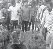  ?? MANOJ KUMAR/HT ?? Md Naeem, a cattle trader, pleads for mercy with the mob that thrashed him brutally. He died hours later. He was one among the seven men who were lynched in Jharkhand in a span of 24 hours on the suspicion of being child lifters.