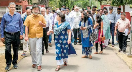  ??  ?? CIVIL SOCIETY MEMBERS leave after a meeting with Divisional Commission­er D. Suresh seeking a solution to the trouble over Friday prayers, on May 8.