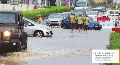  ?? Pankaj Sharma/Gulf News ?? A traffic jam at Dubai Sports City following the rain yesterday.